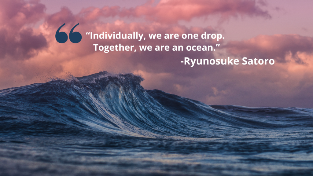 Image of blue wave with a pink-purple cloudy sky in background. On top of image there is a quote in white text that reads, “Individually, we are one drop. Together, we are an ocean.” -Ryunosuke Satoro