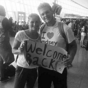 Lyndsey at the airport, getting picked up after a trip to the Dominican Republic